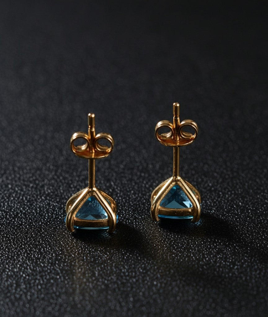Clear Sky Studs: Natural Cushion Blue Topaz Earrings in Sterling Silver
