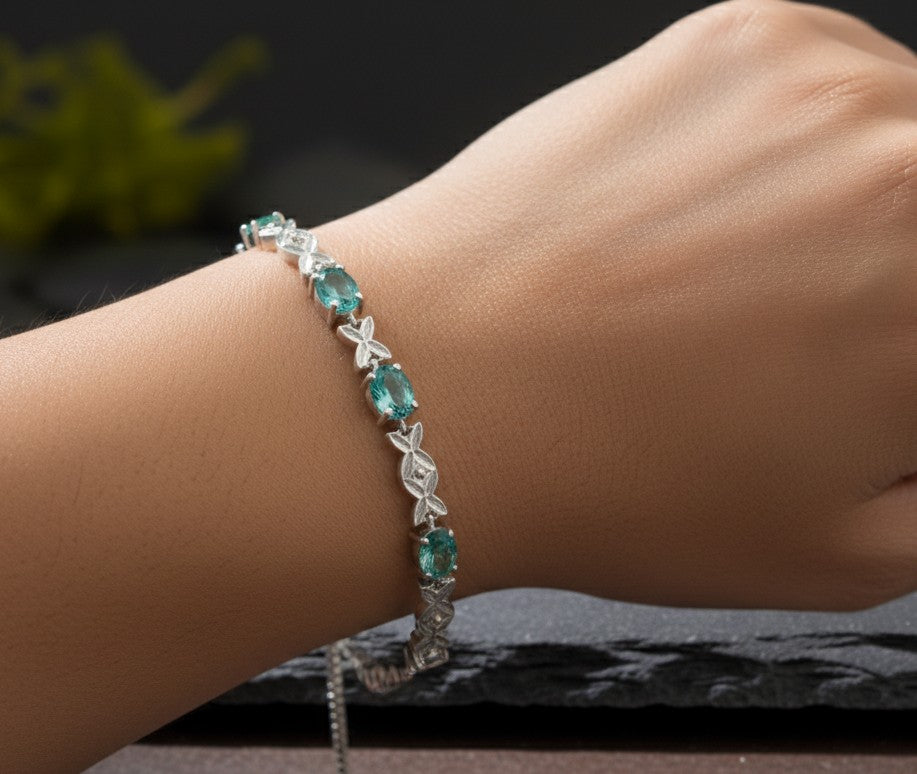 Ocean Whisper Slider: Natural Channel-Set Blue Topaz Bracelet in Sterling Silver