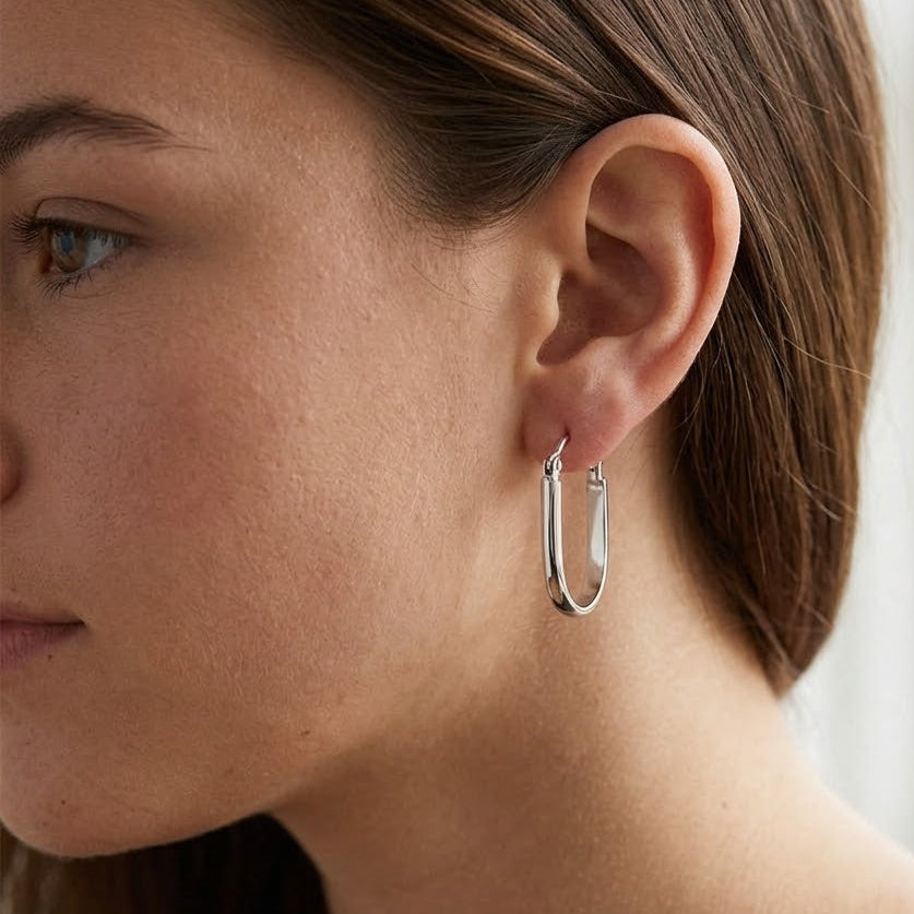 Oval Huggie Hoop Earrings – Polished Silver Elongated Hoops for Women