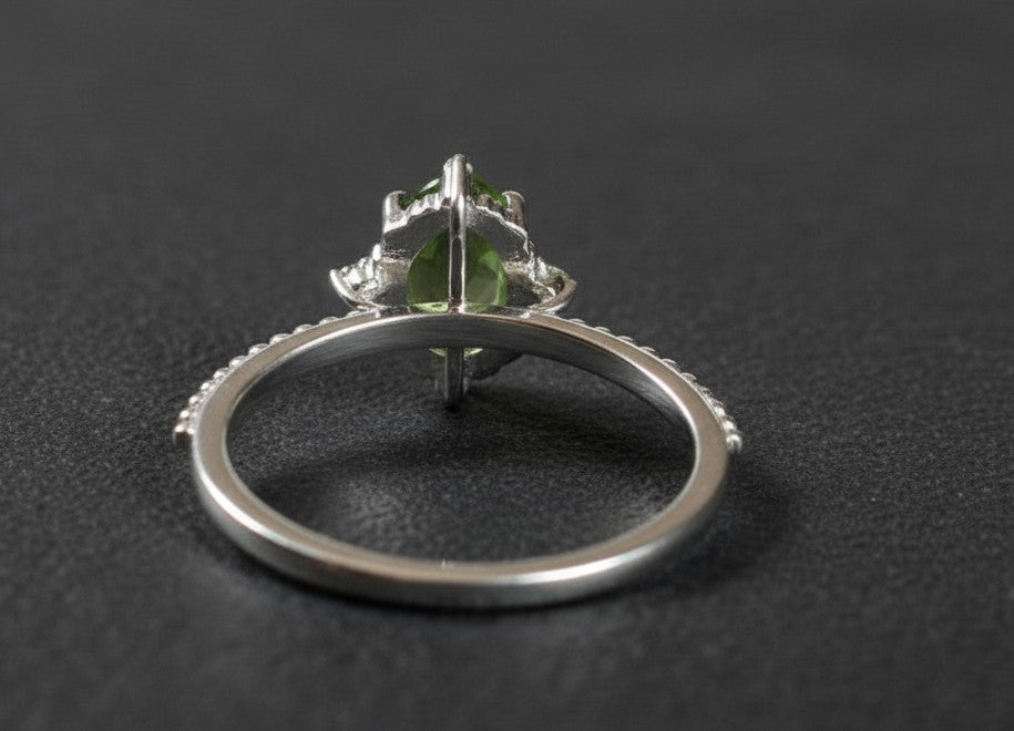 Verdant Glow Ring: Natural Oval Peridot with Dazzling Moissanite Accents