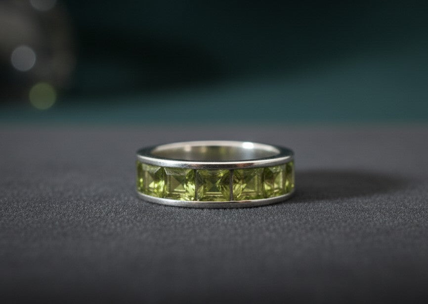 Verdant Glow Band: Natural Channel-Set Peridot Eternity Ring in Sterling Silver