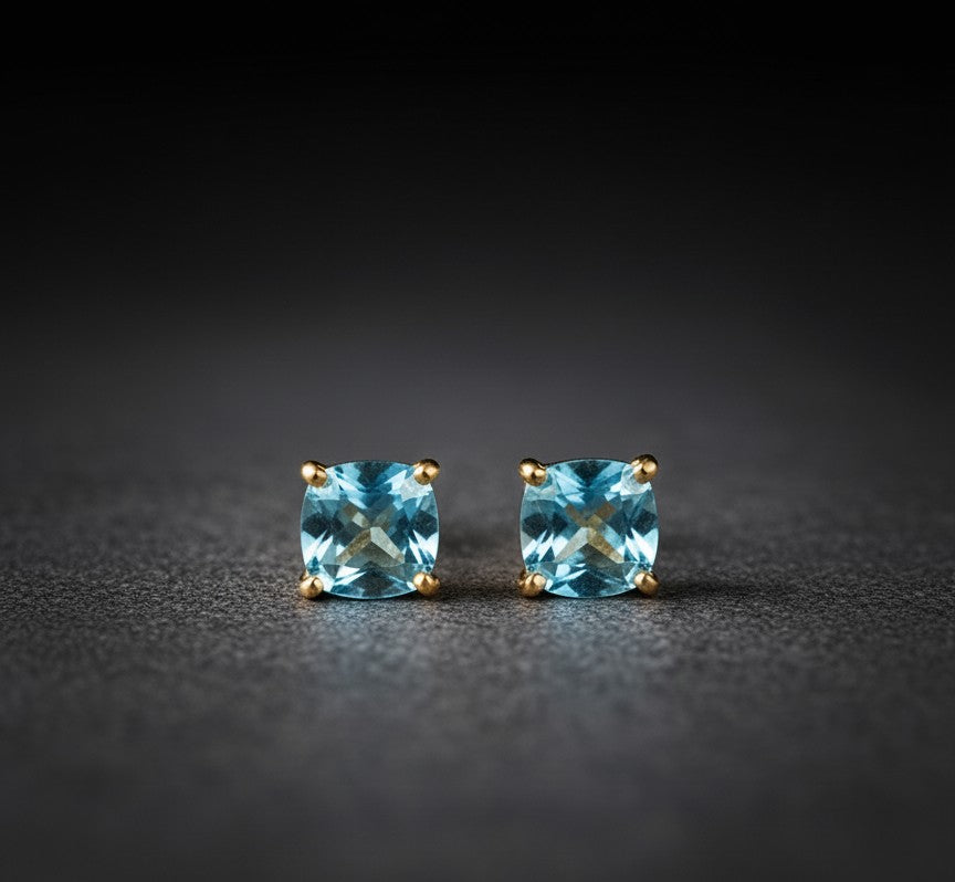 Clear Sky Studs: Natural Cushion Blue Topaz Earrings in Sterling Silver