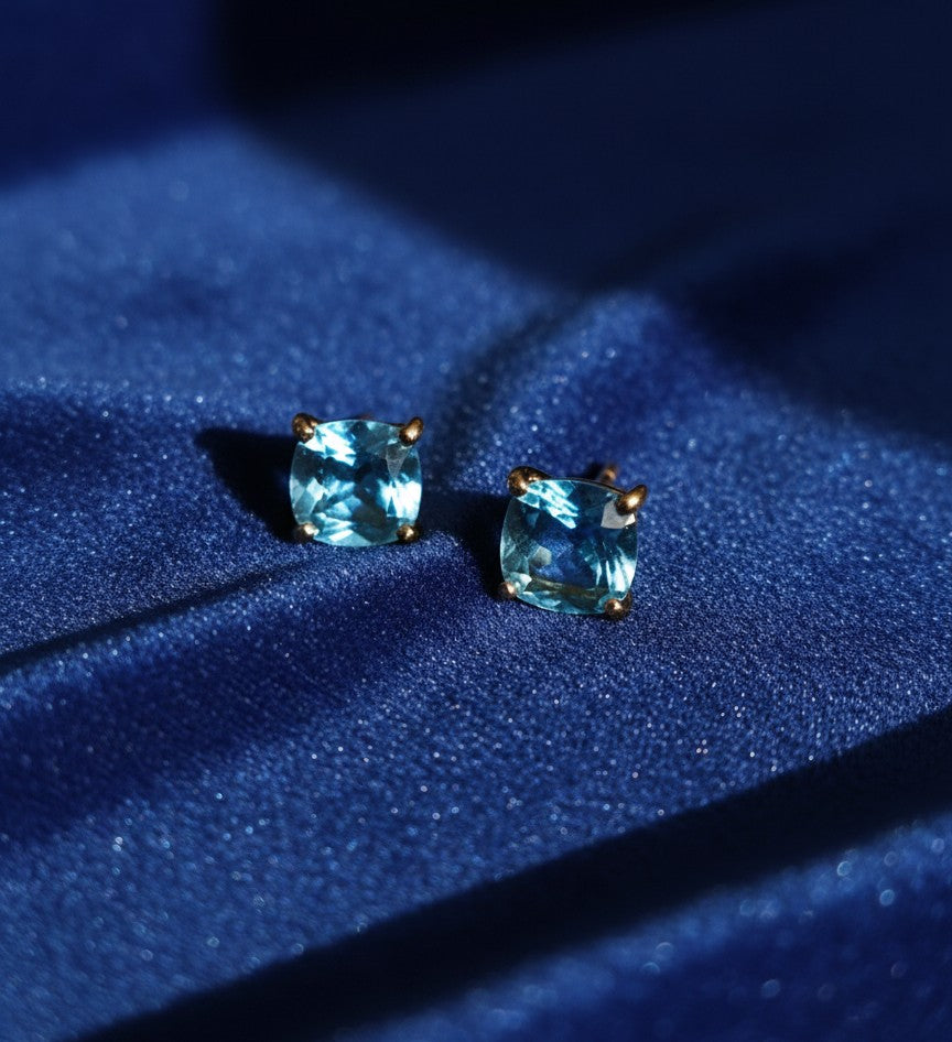Clear Sky Studs: Natural Cushion Blue Topaz Earrings in Sterling Silver