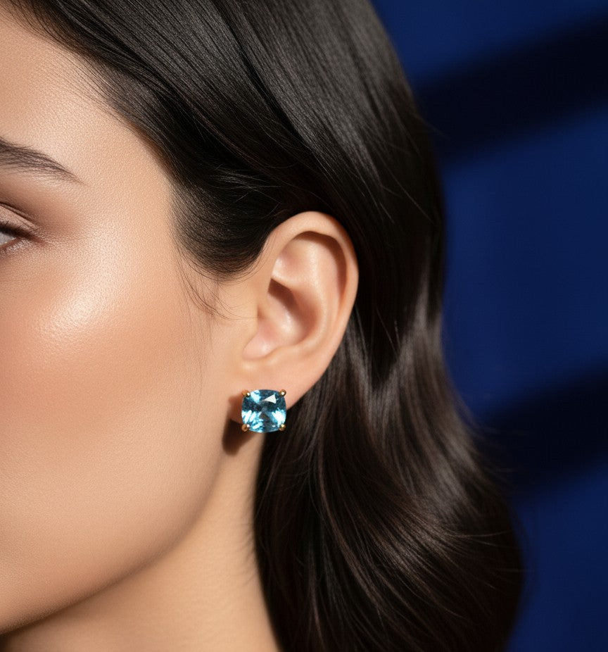 Clear Sky Studs: Natural Cushion Blue Topaz Earrings in Sterling Silver