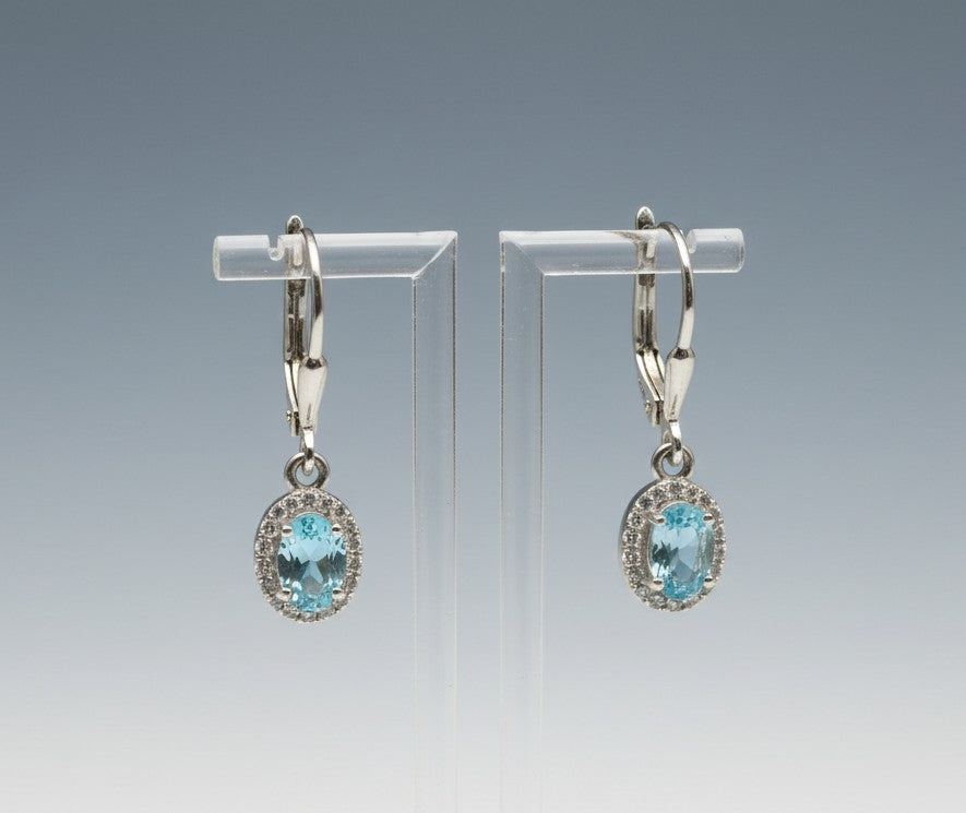 Ocean Serenity Dangles: Natural Blue Topaz Halo Drop Earrings in Sterling Silver