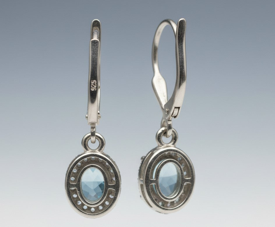 Ocean Serenity Dangles: Natural Blue Topaz Halo Drop Earrings in Sterling Silver
