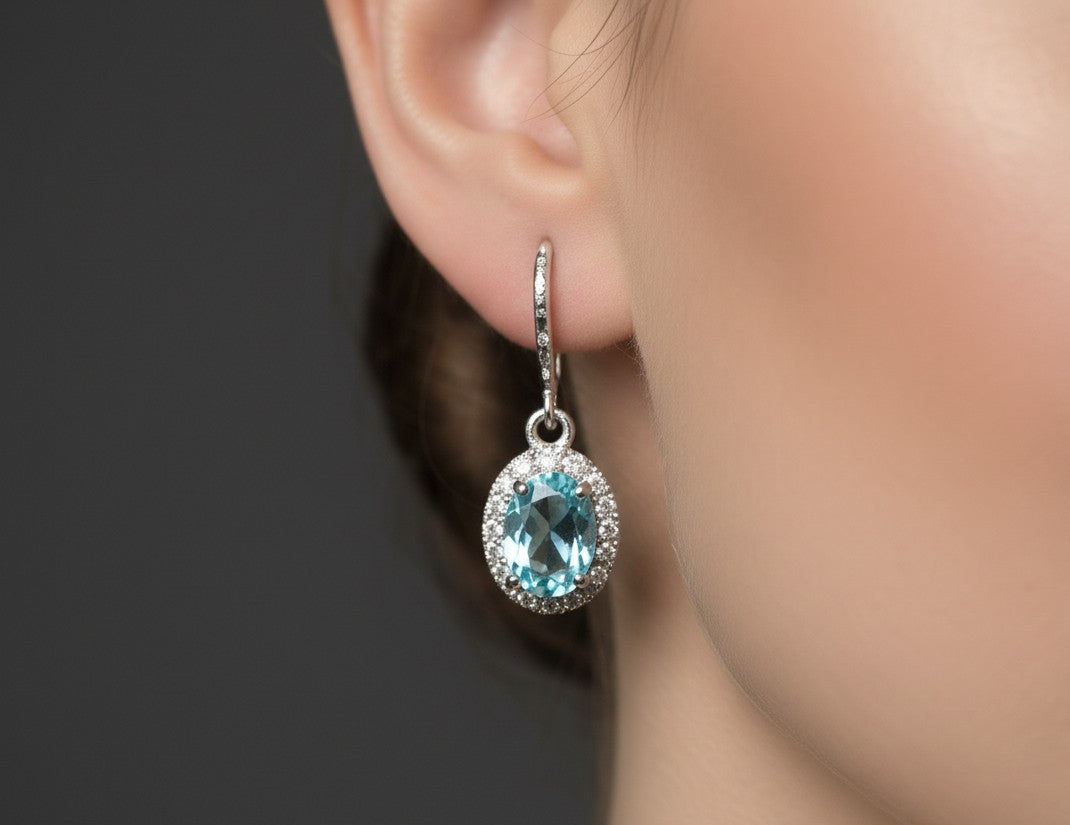 Ocean Serenity Dangles: Natural Blue Topaz Halo Drop Earrings in Sterling Silver