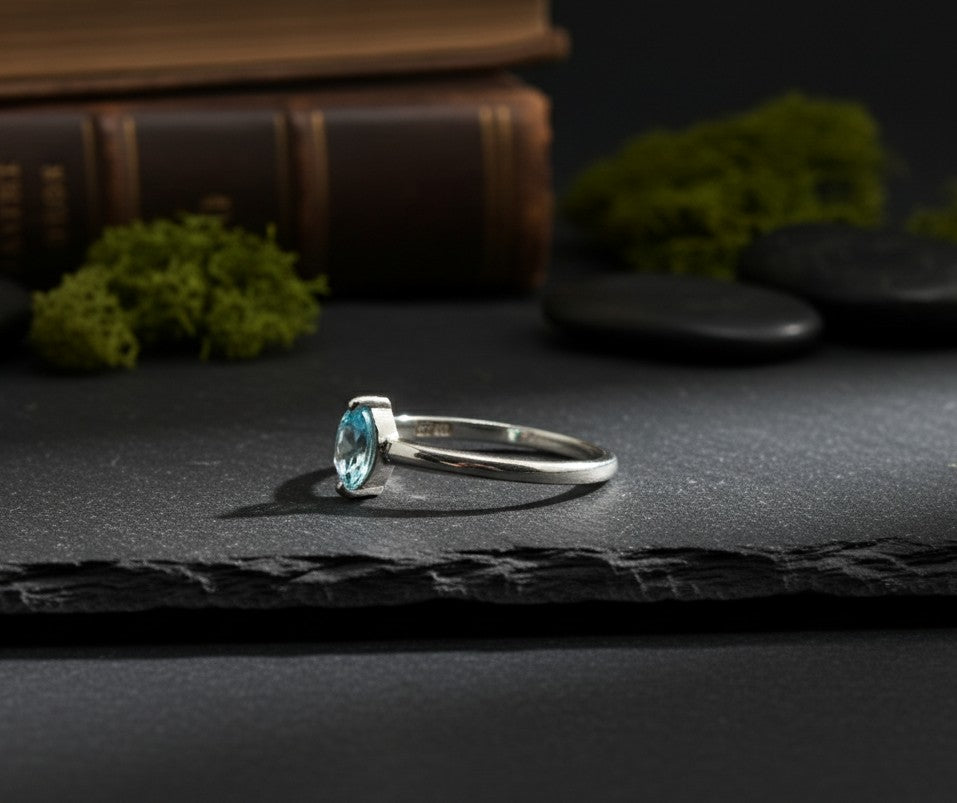 Celestial Point Ring: Natural Marquise Blue Topaz Solitaire in Sterling Silver