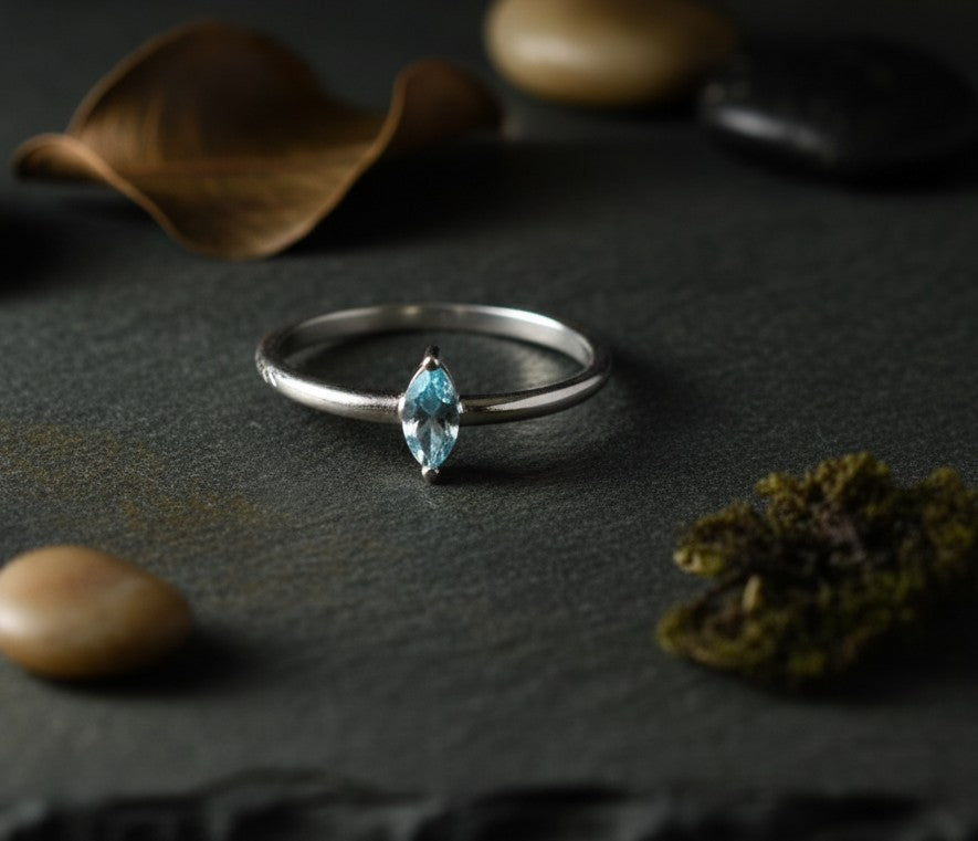 Celestial Point Ring: Natural Marquise Blue Topaz Solitaire in Sterling Silver