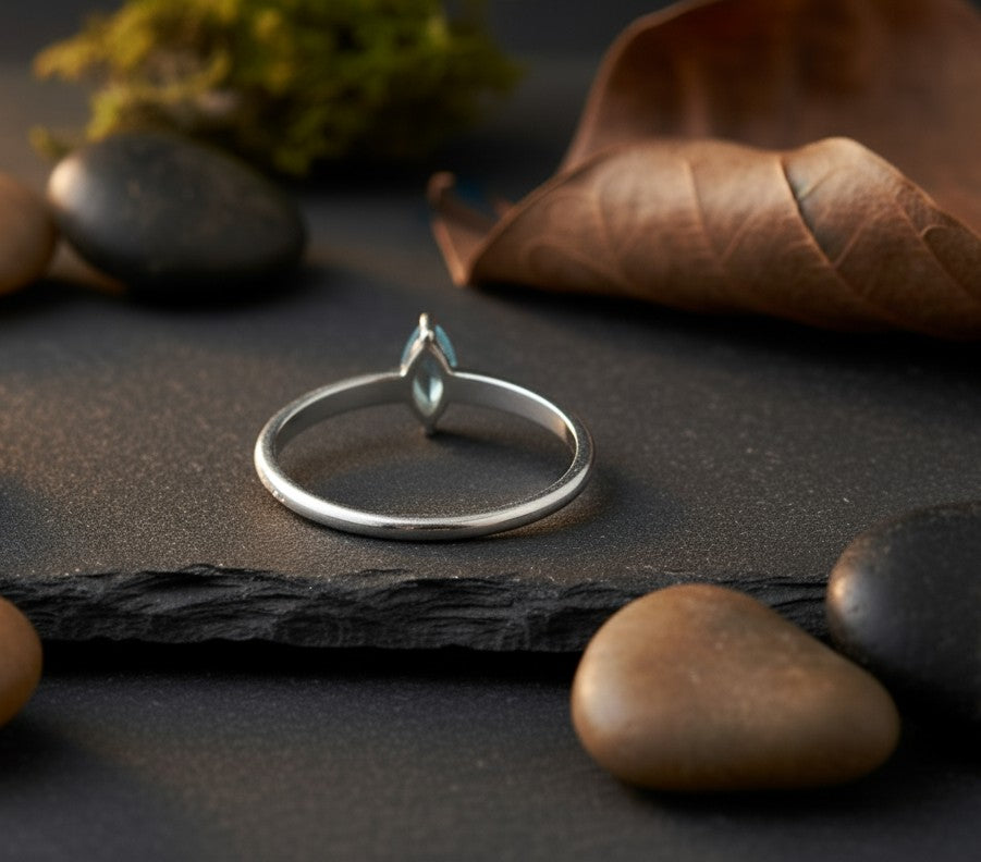 Celestial Point Ring: Natural Marquise Blue Topaz Solitaire in Sterling Silver