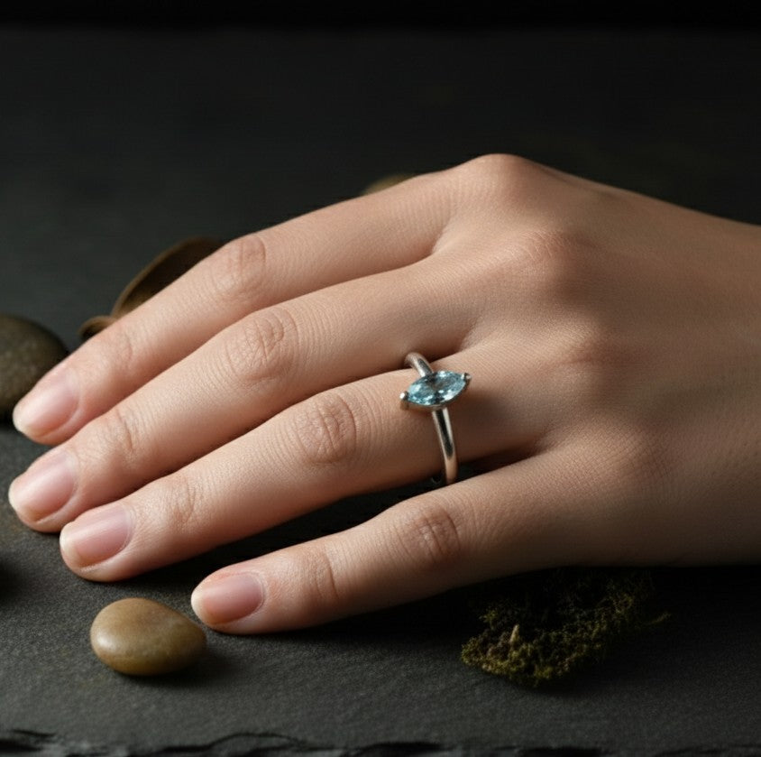 Celestial Point Ring: Natural Marquise Blue Topaz Solitaire in Sterling Silver