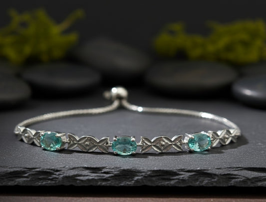 Ocean Whisper Slider: Natural Channel-Set Blue Topaz Bracelet in Sterling Silver