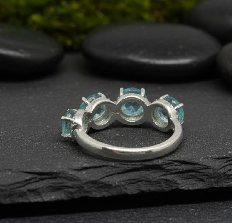 Ocean Serenity Ring: Natural Blue Topaz & Brilliant Moissanite Halo Band