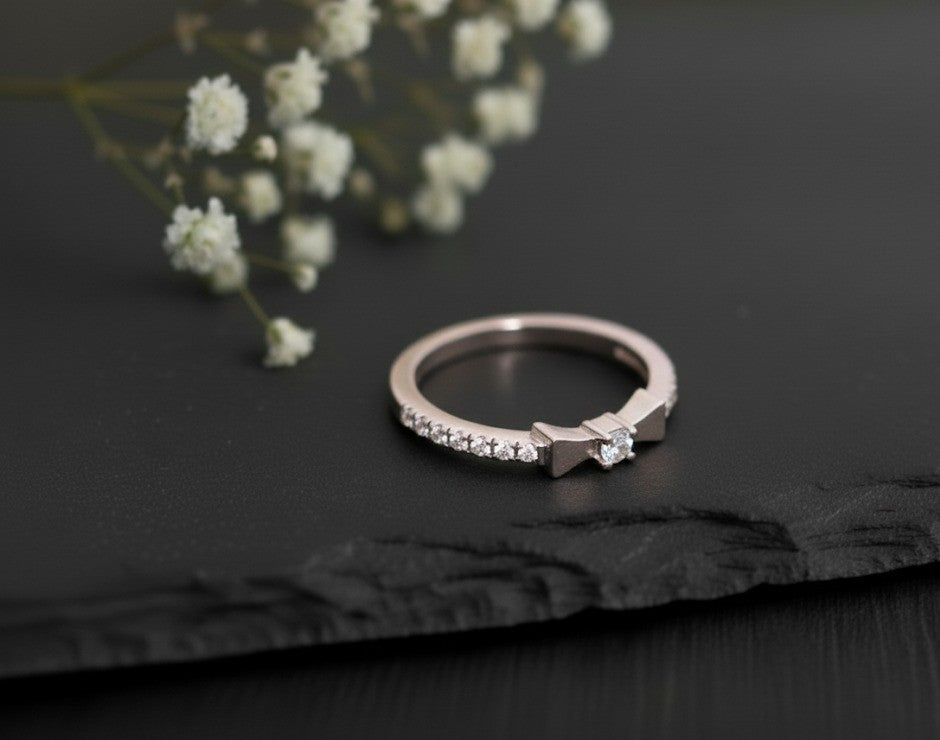 Brilliant Bow Stacker: Natural Moissanite Eternity Band with Central Focus