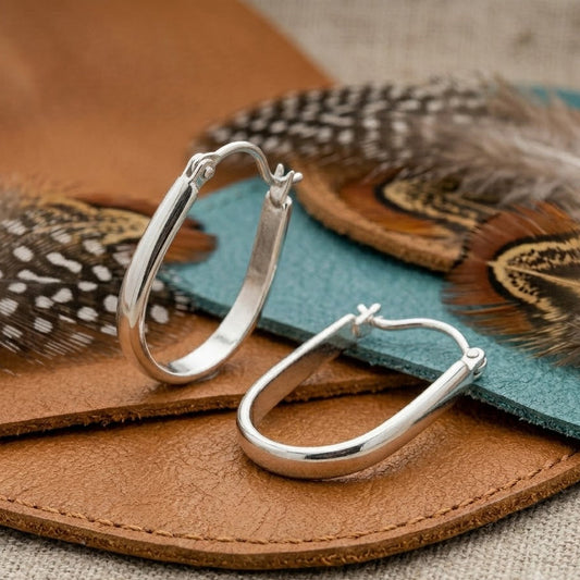 Oval Huggie Hoop Earrings – Polished Silver Elongated Hoops for Women