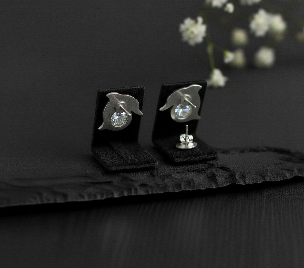 Playful Sparkle Studs: Natural Moissanite Dolphin Earrings in Sterling Silver