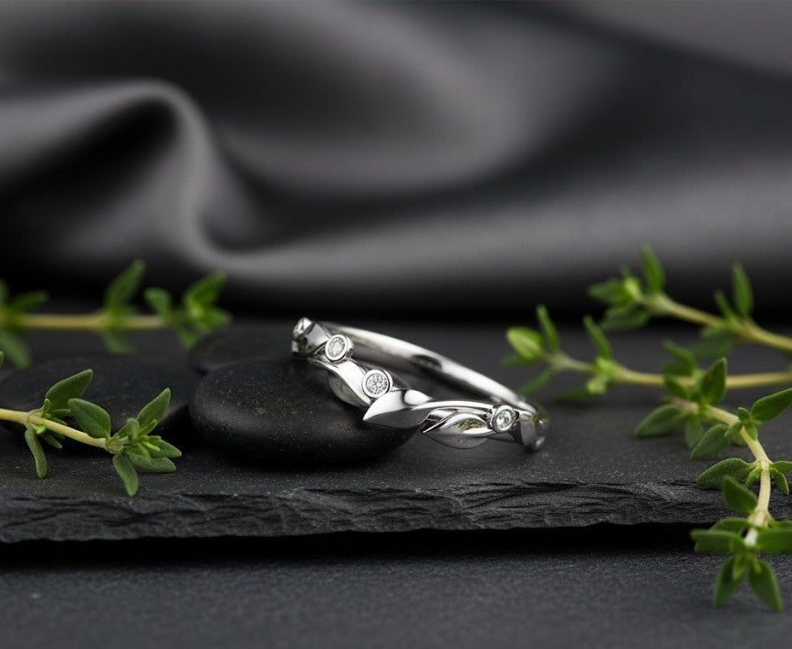 Whispering Leaves Ring: Natural Moissanite Accents in Sterling Silver Vine Band