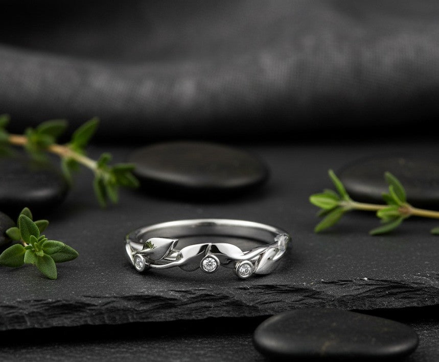 Whispering Leaves Ring: Natural Moissanite Accents in Sterling Silver Vine Band