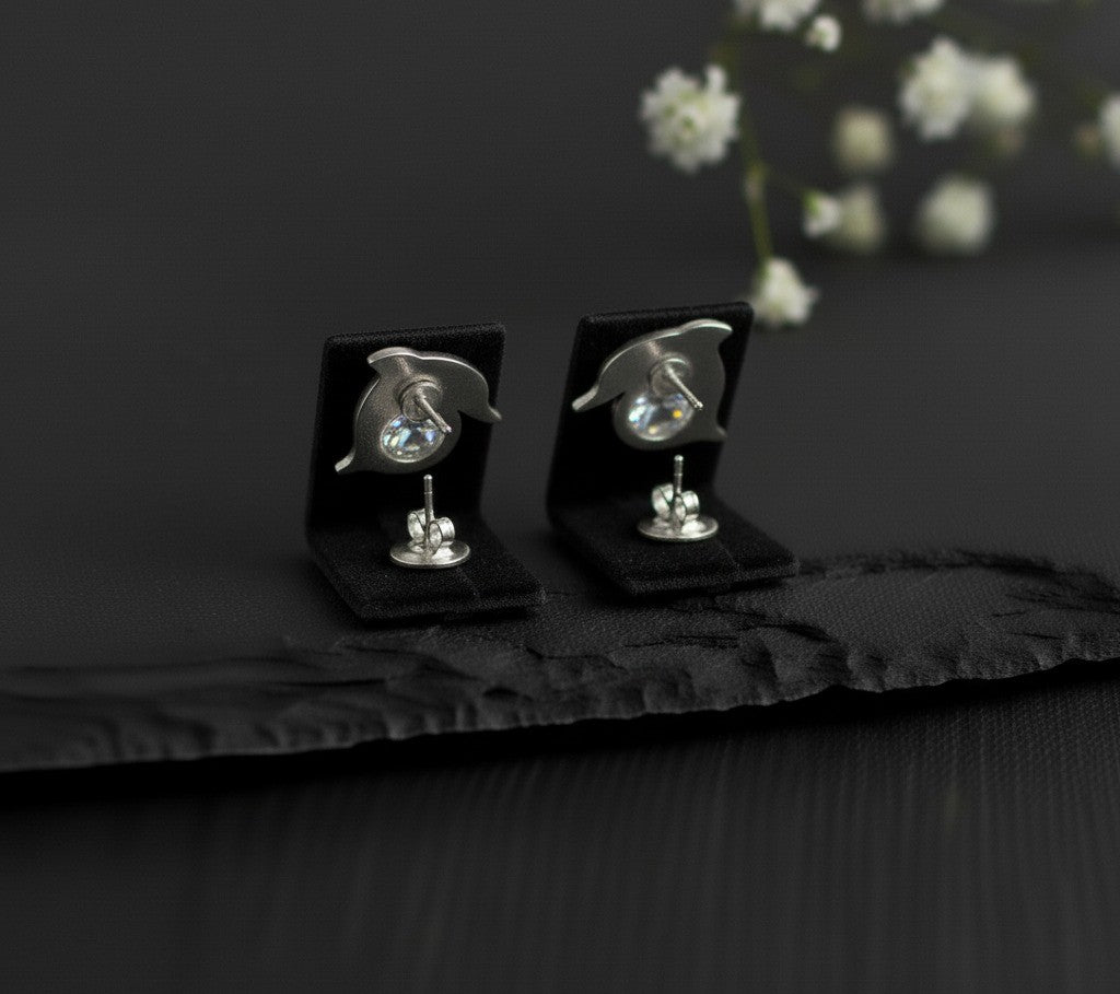 Playful Sparkle Studs: Natural Moissanite Dolphin Earrings in Sterling Silver