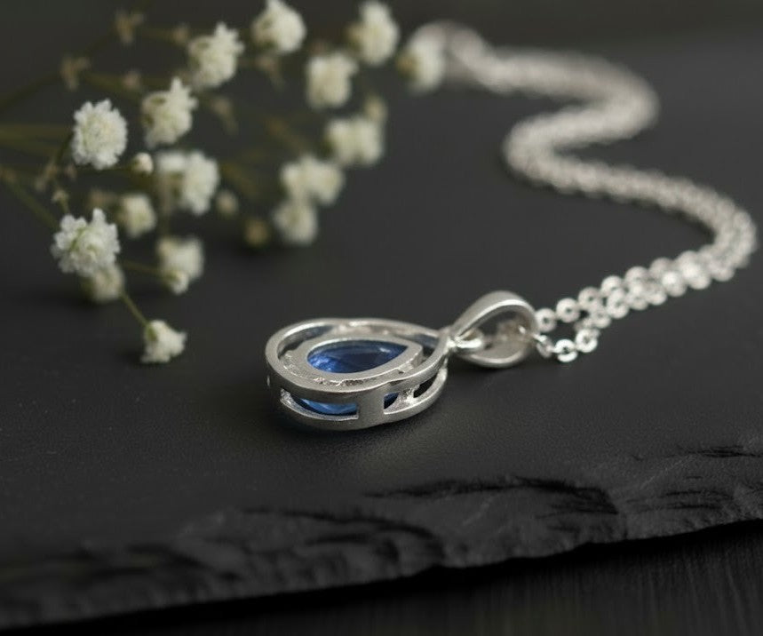 Twilight Dream Set: Natural Pear Tanzanite Pendant and Stud Earrings in Sterling Silver