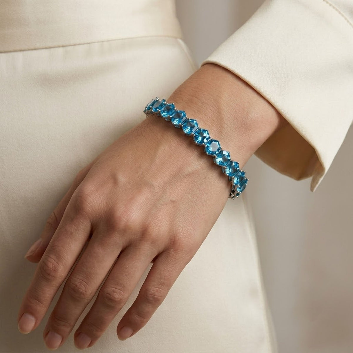 Natural Sky Blue Topaz Hexagon Cut Tennis Bracelet in 925 Sterling Silver.