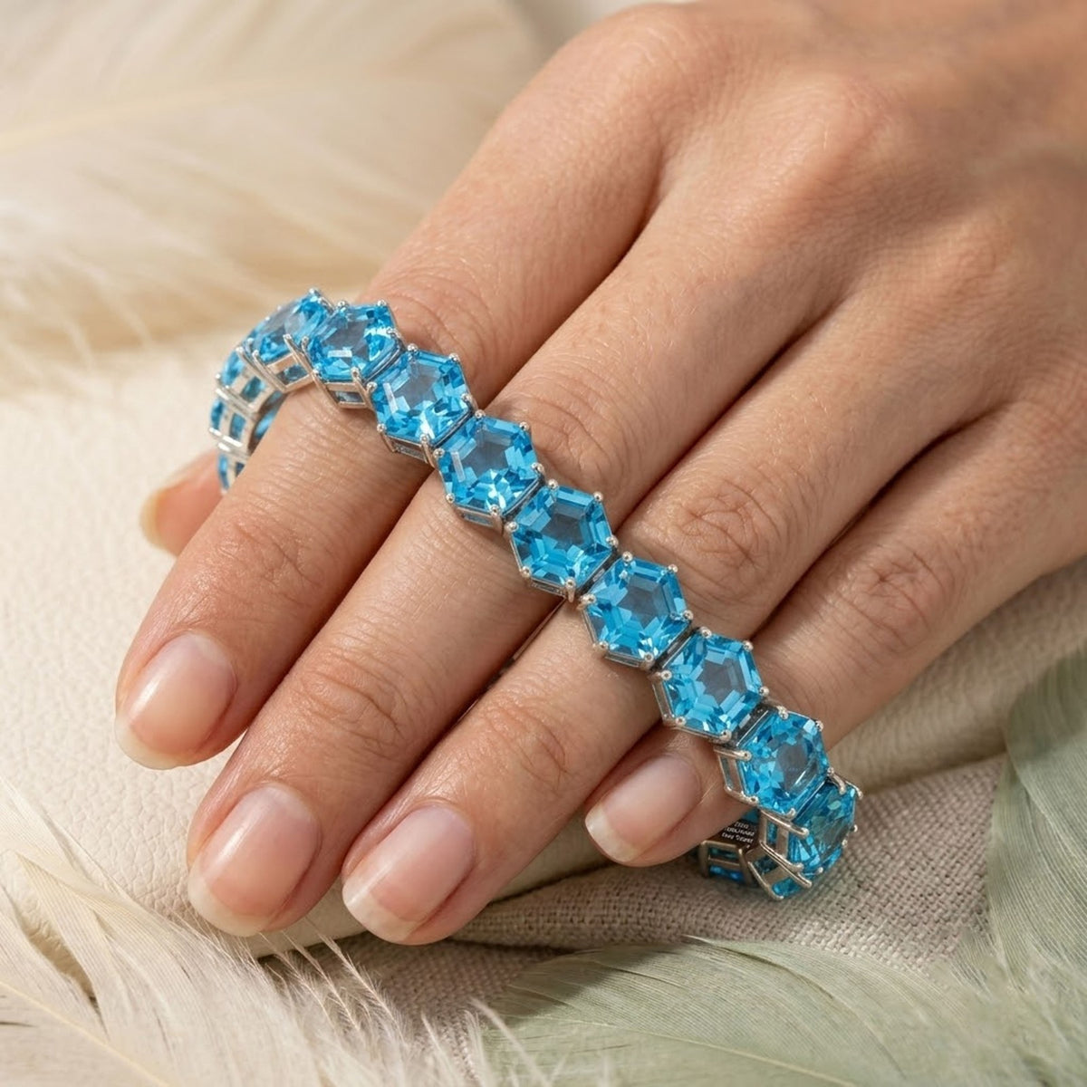 Natural Sky Blue Topaz Hexagon Cut Tennis Bracelet in 925 Sterling Silver.