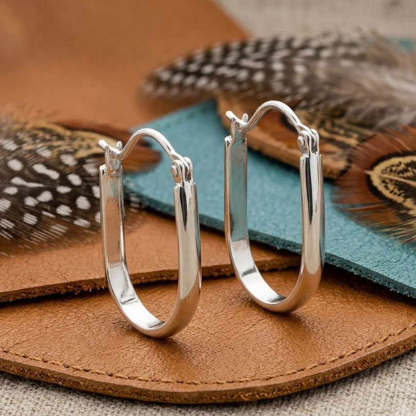 Oval Huggie Hoop Earrings – Polished Silver Elongated Hoops for Women