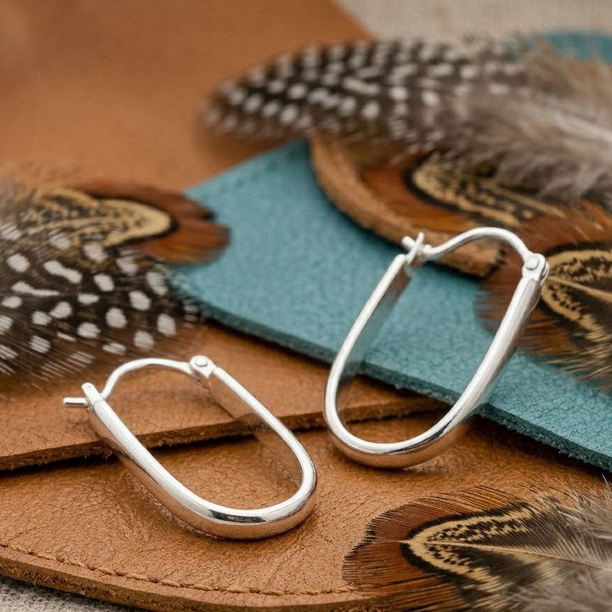 Oval Huggie Hoop Earrings – Polished Silver Elongated Hoops for Women