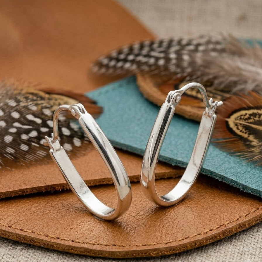 Oval Huggie Hoop Earrings – Polished Silver Elongated Hoops for Women