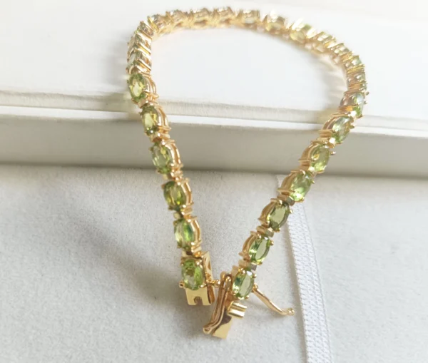 Natural Oval cut Peridot Tennis Bracelet In Platinum Overlay Sterling Silver . - Image 5