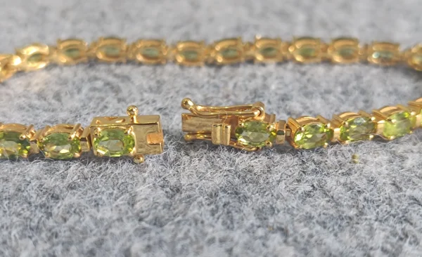 Natural Oval cut Peridot Tennis Bracelet In Platinum Overlay Sterling Silver . - Image 4