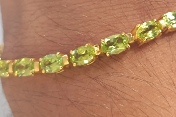 Natural Oval cut Peridot Tennis Bracelet In Platinum Overlay Sterling Silver . - Image 3